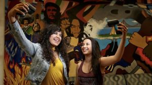 UC Irvine students Angela Vera, left, and Daniela Estrada are part of the growing Latino student population at the university. (Robert Gauthier / Los Angeles Times)